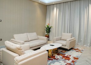 Superior Suite, Balcony, City View | Living area