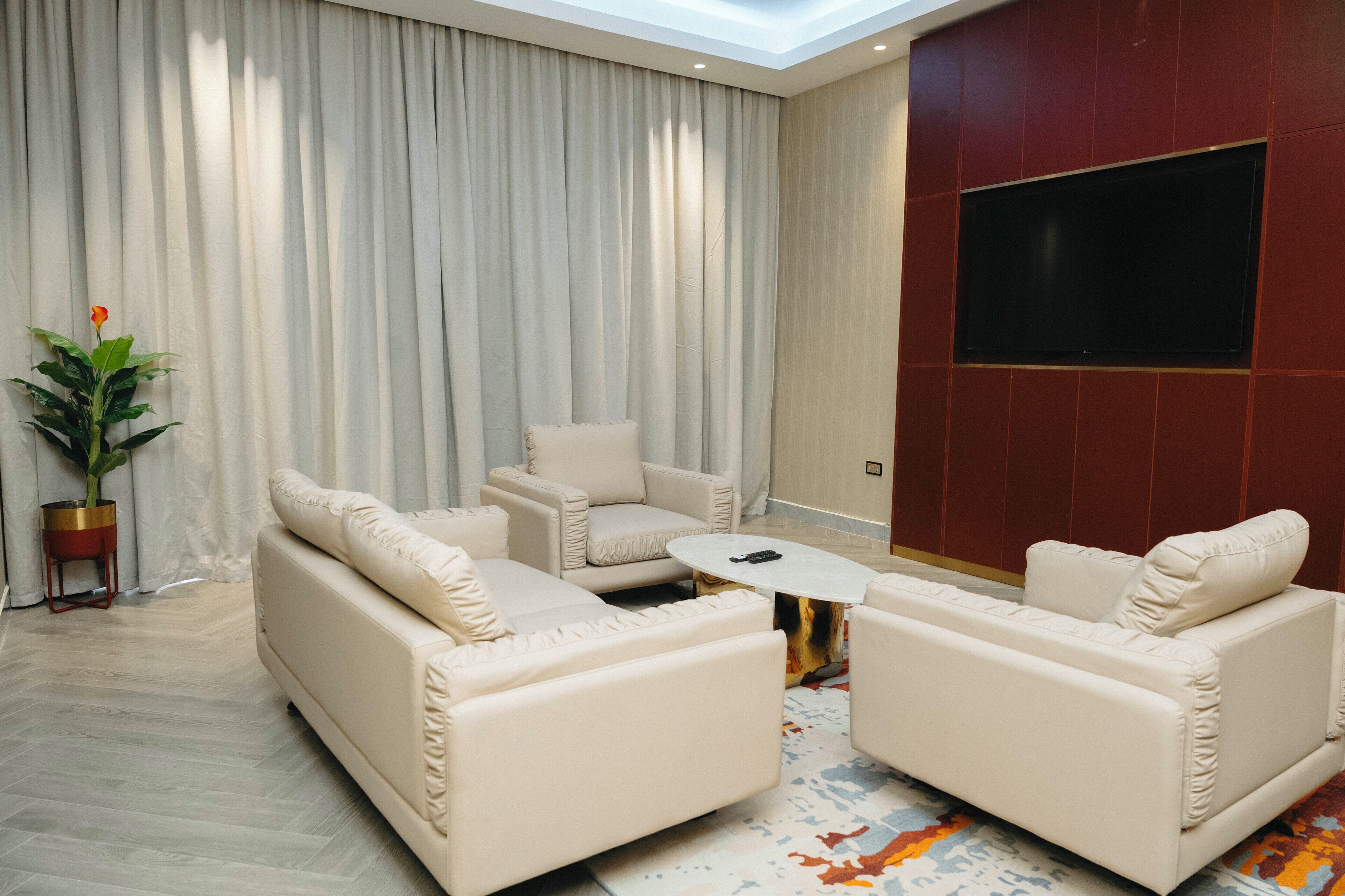 Superior-Suite, Balkon, Stadtblick | Wohnbereich