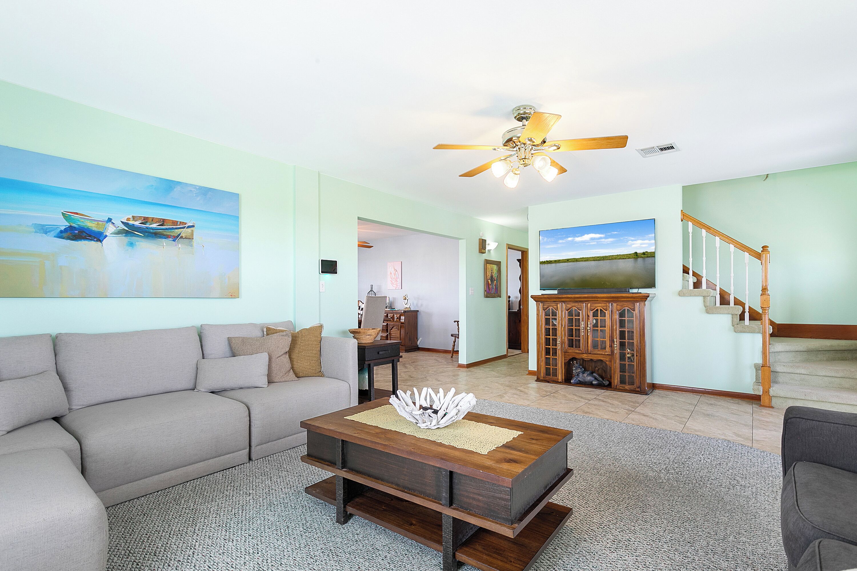 Signature House, 3 Bedrooms, Patio, Canal View | Living room | 49-inch Smart TV with digital channels