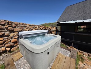 Bañera de hidromasaje al aire libre