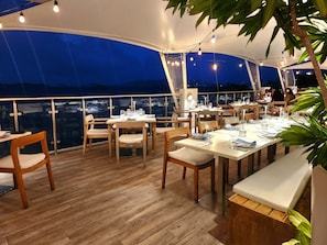 Outdoor dining - New Owners, New Updates, Same Stunning Views at "No Bad SEAson" (East End)