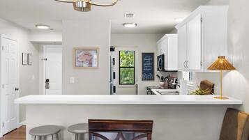 Condo, Multiple Beds, Balcony, Garden View (The Joyful Getaway) | Private kitchen | Fridge, microwave, oven, stovetop