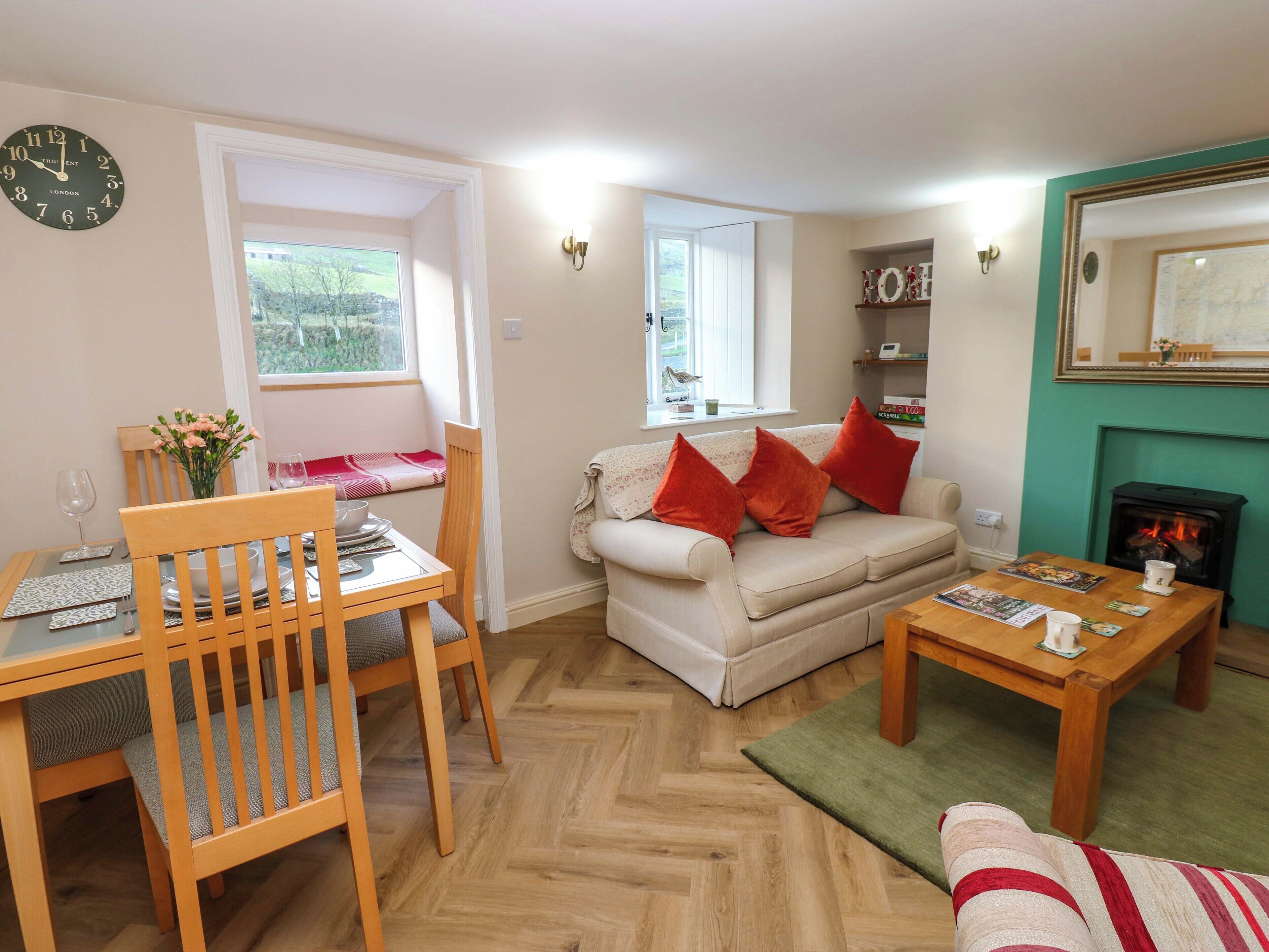 Cottage | Woonruimte | Een open haard