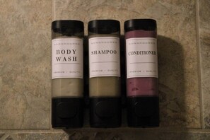 Hair dryer, towels, soap, toilet paper