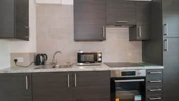 Fridge, toaster, cookware/dishes/utensils