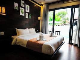 Junior Double Room, Poolside | In-room safe, desk, laptop workspace, blackout drapes