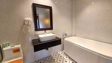 Junior Double Room, Poolside | Bathroom | Rainfall showerhead, designer toiletries, hair dryer, slippers