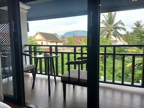 Deluxe Double Room, Pool View | In-room safe, blackout drapes, soundproofing, iron/ironing board
