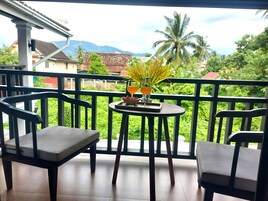 Junior Double Room, Poolside | In-room safe, desk, laptop workspace, blackout drapes