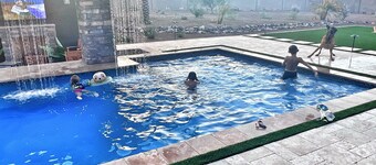 Spacious 4-bedroom house with WiFi, AC in marvelous area with Pool