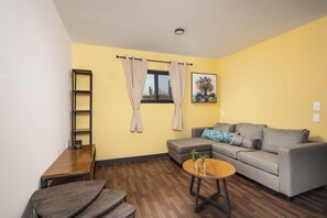 Deluxe-Villa, Balkon, Meerblick | Wohnbereich