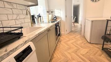 Fridge, microwave, coffee/tea maker, toaster