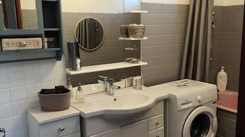 Hair dryer, towels, soap, shampoo