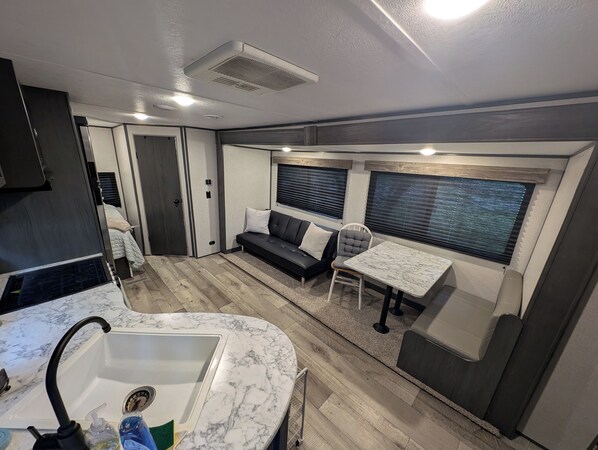 Interior - Rustic Pines Ranch Cozy Camper (Chuluota)