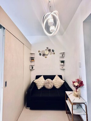 Condo, 1 Bedroom | Living area - Paradise Staycation At South! (Las Pinas)