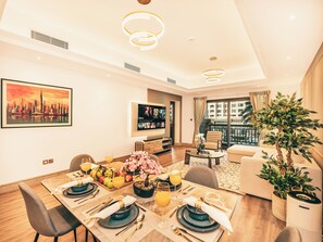 Appartement Signature, 1 chambre, vue ville, en bord de plage | Salle à manger