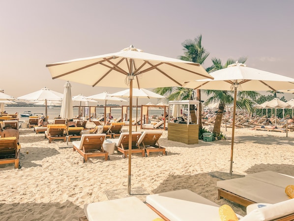 Private beach, white sand, free beach cabanas, sun loungers