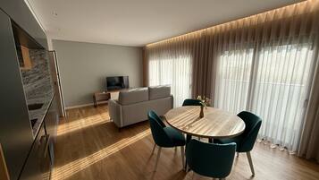 Comfort Apartment, 2 Bedrooms, City View | Living area | 43-inch LCD TV with cable channels