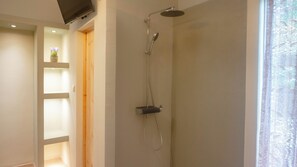 Shower, hair dryer, towels, soap