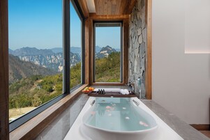 Family Quadruple Room, Multiple Beds, Private Bathroom, Hill View | Bathroom | Free toiletries, hair dryer, bathrobes, slippers