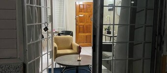 Enjoy this central, stylish 1 bedroom apt. with AC, wi-fi, security, and more!