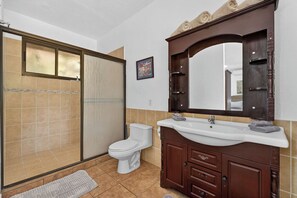 Shower, towels, soap, toilet paper