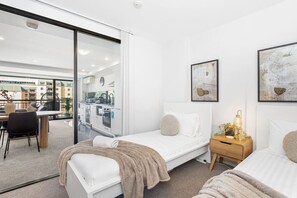 2 bedrooms, desk, iron/ironing board, travel crib