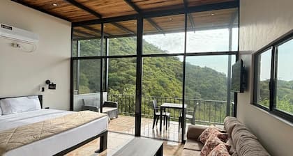 Charming boutique resort in pleasant Puerto Lopez with WiFi, fitness room, AC