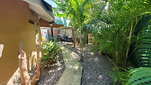 Property grounds - Charming 1-BR cottage w/ WiFi and AC w/ pool and beach access in Runaway Bay (Runaway Bay)