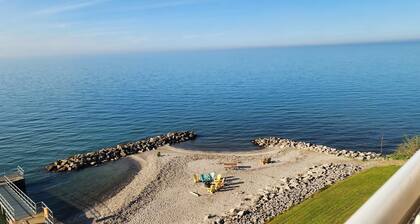 NEW 2-Bedroom Lakefront Condo with private beach/indoor pool-rent 3/ 4th free