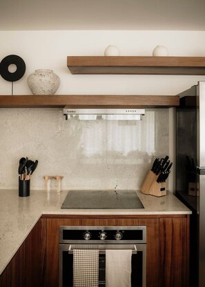 Fridge, microwave, stovetop, coffee/tea maker