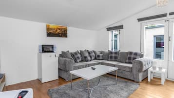 Loft, 1 habitación, vista al jardín | Sala de estar