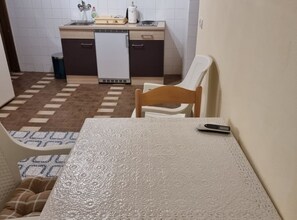 Fridge, stovetop, cookware/dishes/utensils