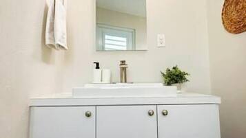 Hair dryer, towels, soap, shampoo