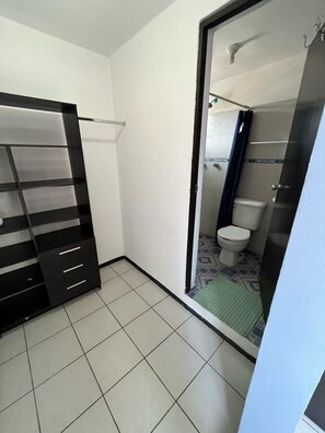 Shower, towels, soap, toilet paper