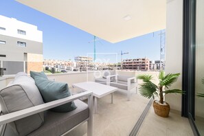 Property grounds - Casa Alegria in Amanecer Resort – pool, playground and family comfort - by OYOOSTAYS (Orihuela Costa)