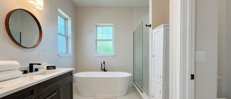 Shower, towels, soap, toilet paper