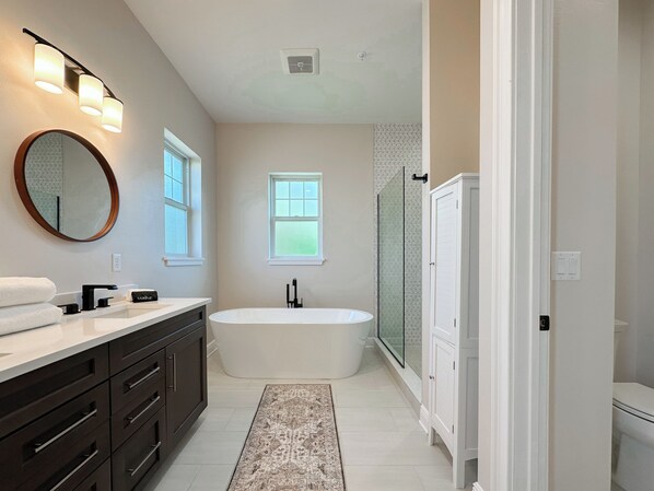 Shower, towels, soap, toilet paper
