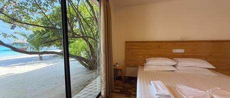 Deluxe Double or Twin Room, Sea View, Beachfront | In-room safe, desk, blackout drapes, free WiFi