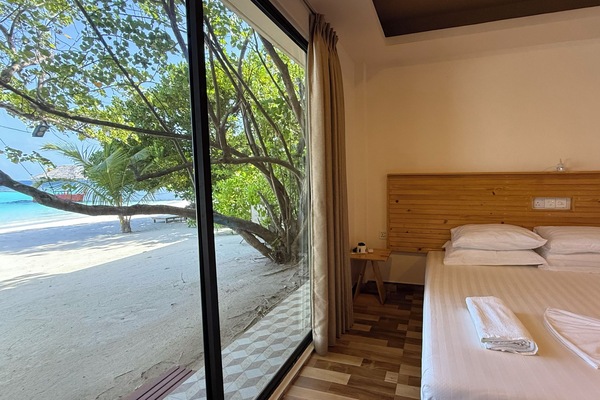 Chambre Deluxe Double ou avec lits jumeaux, vue mer, en front de plage