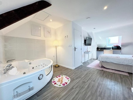 1 chambre. L’instant rose - Cocon fleuri avec jacuzzi