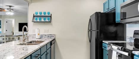Condo, Multiple Beds, Balcony (Sunset View at Anchor’s Point) | Private kitchen | Fridge, microwave, oven, stovetop