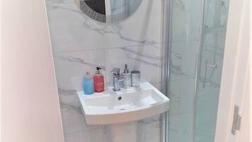 Hair dryer, towels, soap, toilet paper