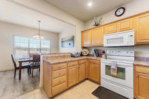 Condo, Multiple Beds, Balcony, Mountain View (The Nest on Birdie Lane) | Private kitchen | Fridge, microwave, oven, stovetop