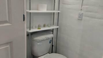 Shower, towels, soap, toilet paper