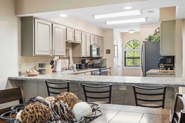 Condo, Multiple Beds, Balcony, Garden View (Cozy Comfort Retreat) | Private kitchen | Fridge, microwave, oven, stovetop