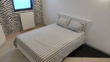 8 dormitorios, tabla de planchar con plancha, wifi y ropa de cama