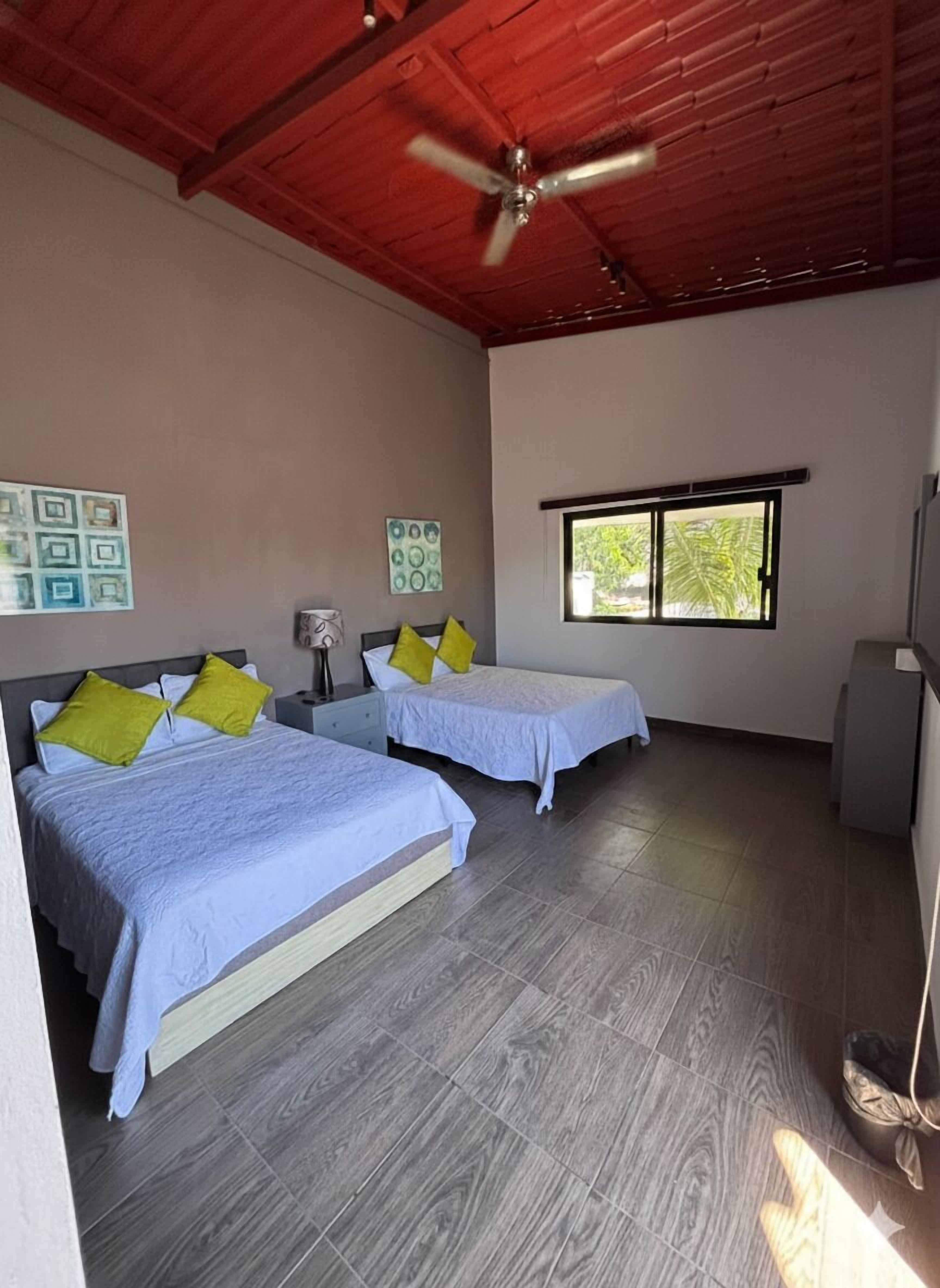 Family Suite, Garden View | Desk, blackout curtains, iron/ironing board, free WiFi