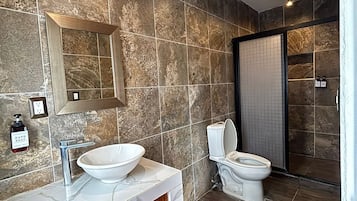 Shower, towels, soap, shampoo