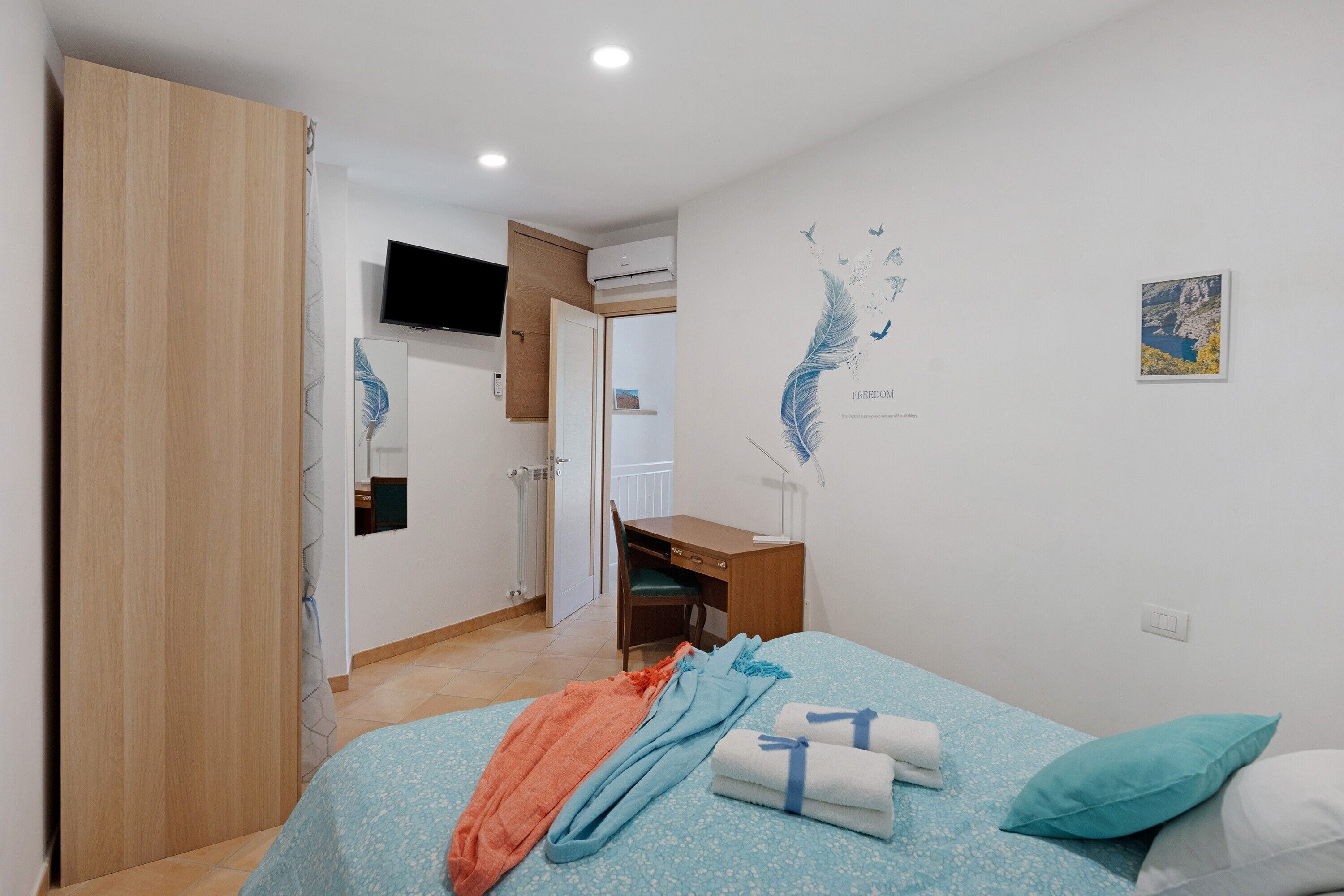 2 slaapkamers, een strijkplank/strijkijzer, gratis wifi, beddengoed